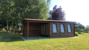 Caseta de jardín Eva E con porche 12m² 7x3m 44mm