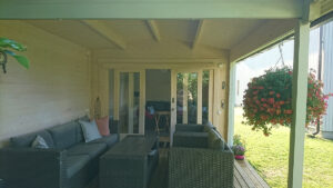 Caseta de jardín con porche Nora E 9m² 6x3m 44mm