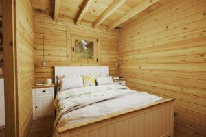 Casa de madera con un dormitorio y altillo “Stefan 5” / 33m² + 10m² / 8m x 4m / 70mm.