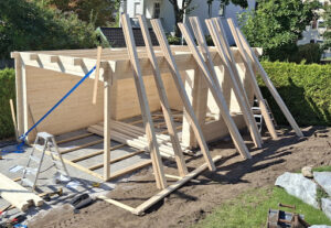 construcción de una cabaña de madera